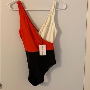 Solid & Striped small one piece bathing suit